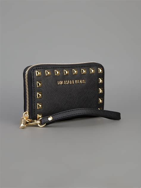 michael kors iphone wallet clutch|Michael Kors studded clutch.